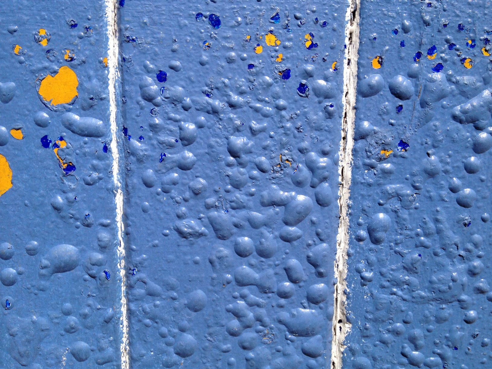 Learn about the causes of paint bubbling and how to fix it.