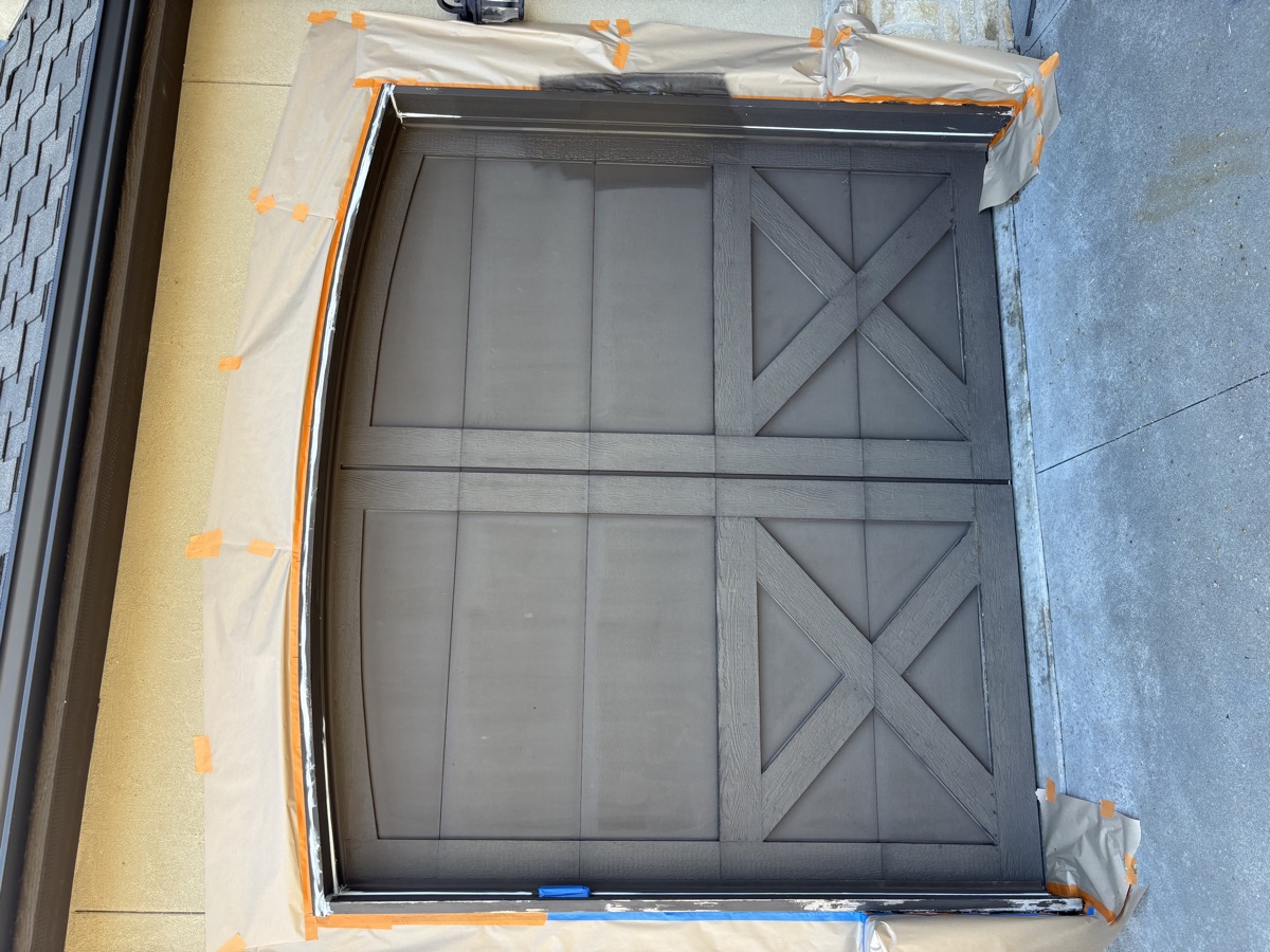 Garage door before painting — Tulsa Oklahoma